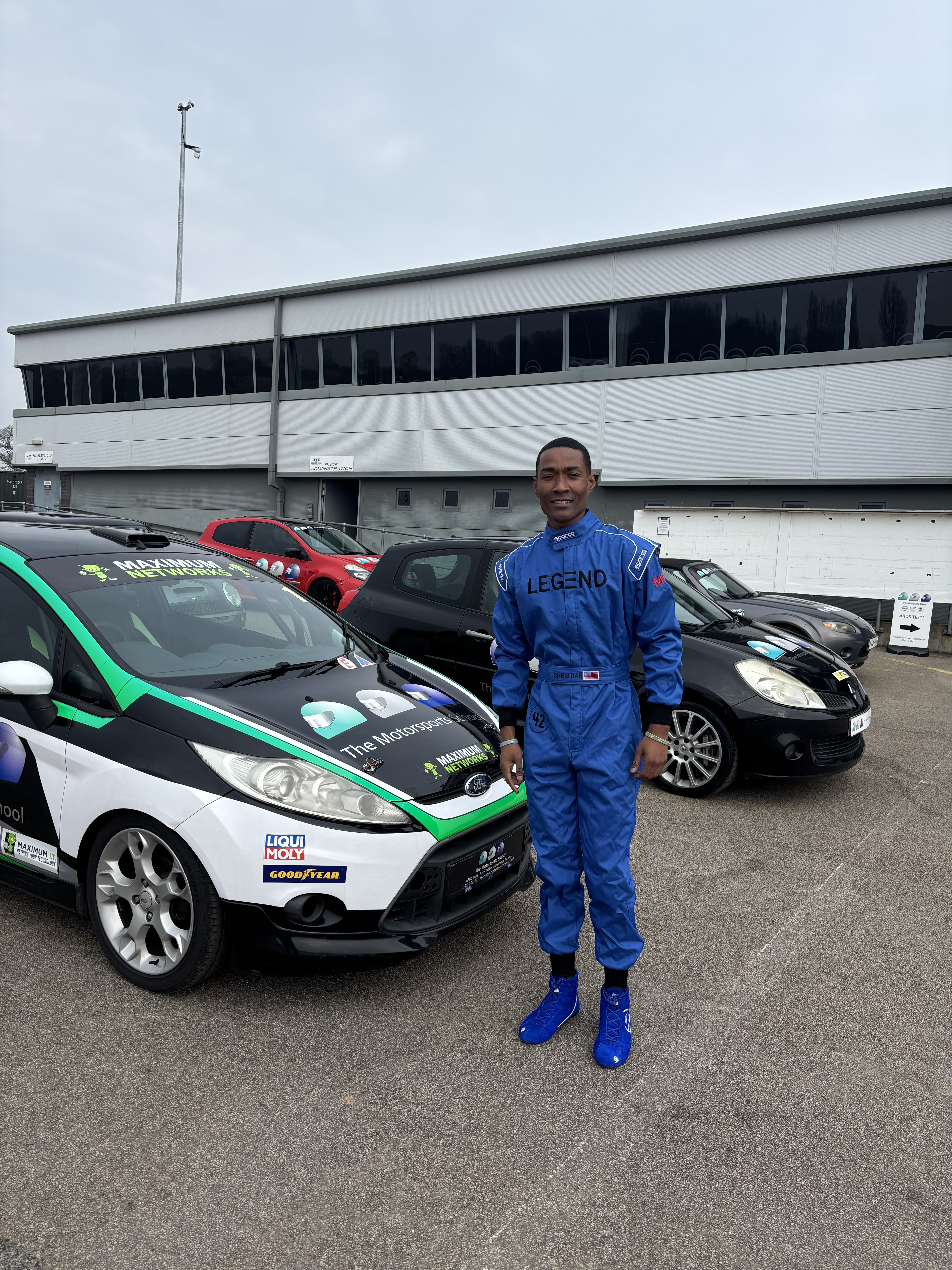 N4R founder Michael Christian on a track day wearing a custom suit.